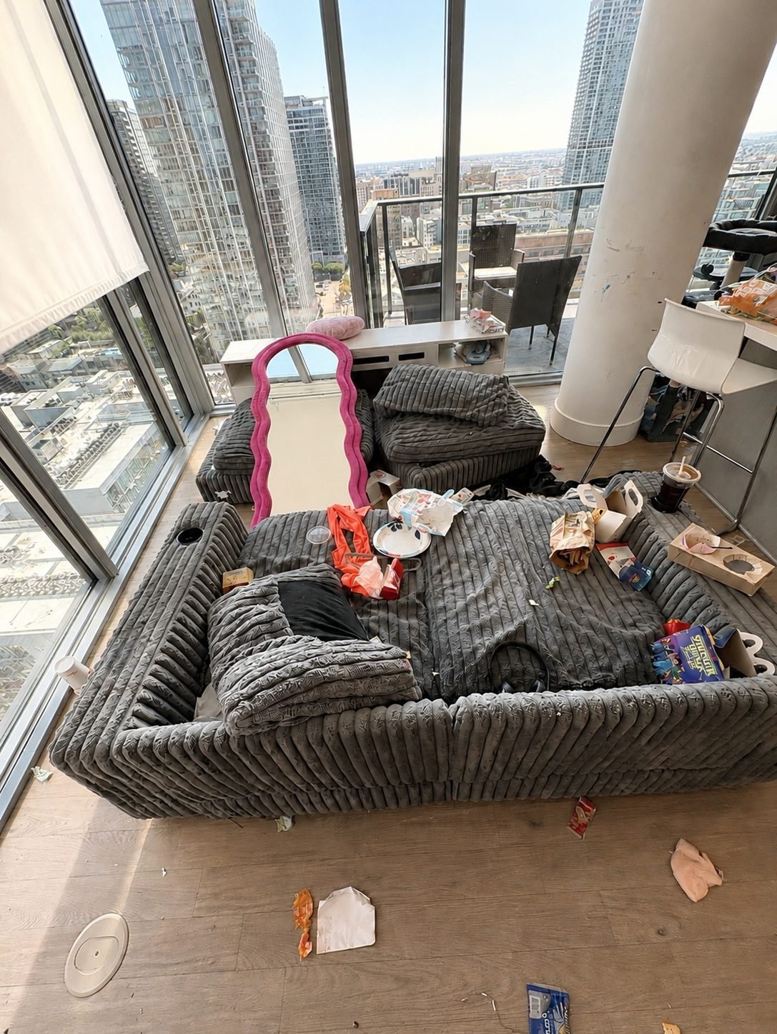 A cluttered living room before Bergamot. cleaned it